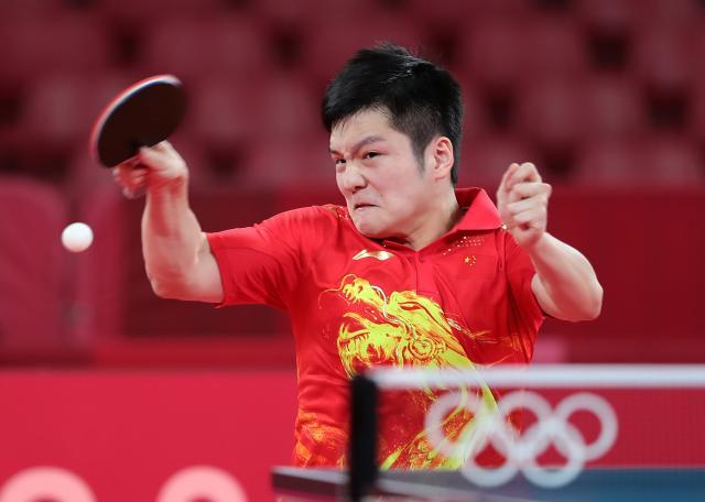 九游体育-马龙樊振东携手晋级八强 日本男单一夜之间被团灭